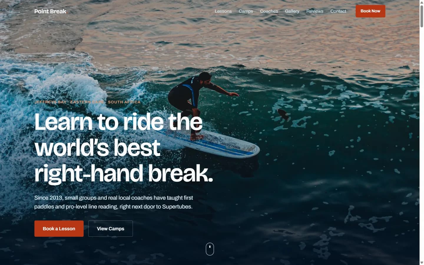 The Point Break Surf Academy hero, showing a surfer riding a wave at Jeffreys Bay at sunset behind the headline
