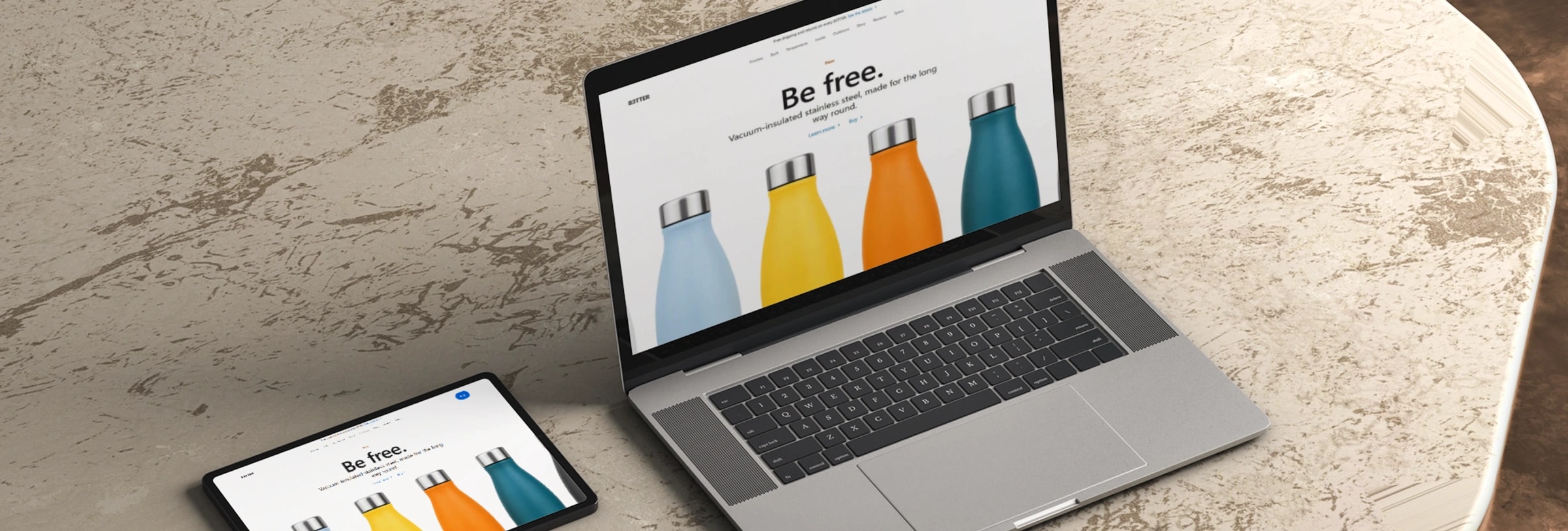 A laptop and phone side by side on a stone table, both showing the B3TTER product page with six bottle colourways