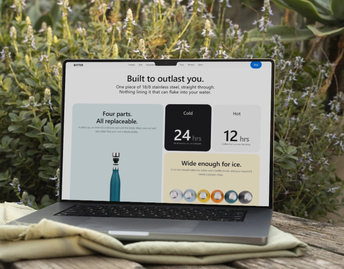 The B3TTER site open on a laptop, viewed from over someone's shoulder